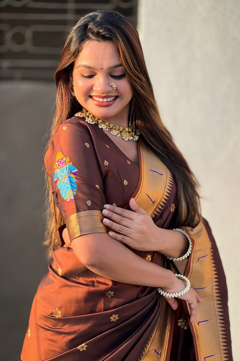 Floral designs woven into brown soft silk sarees