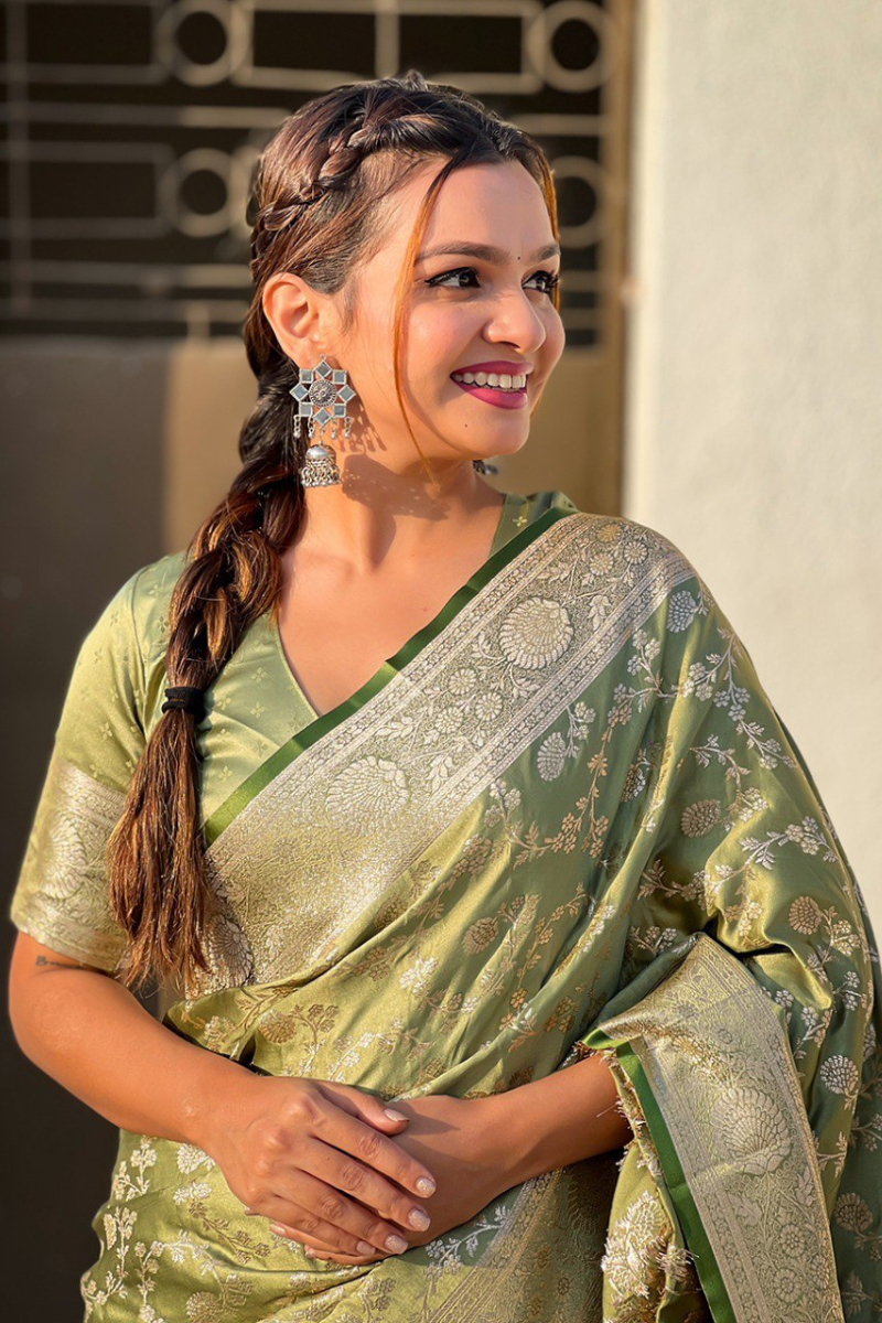 Jaal-adorned green Banarasi antique silk sarees