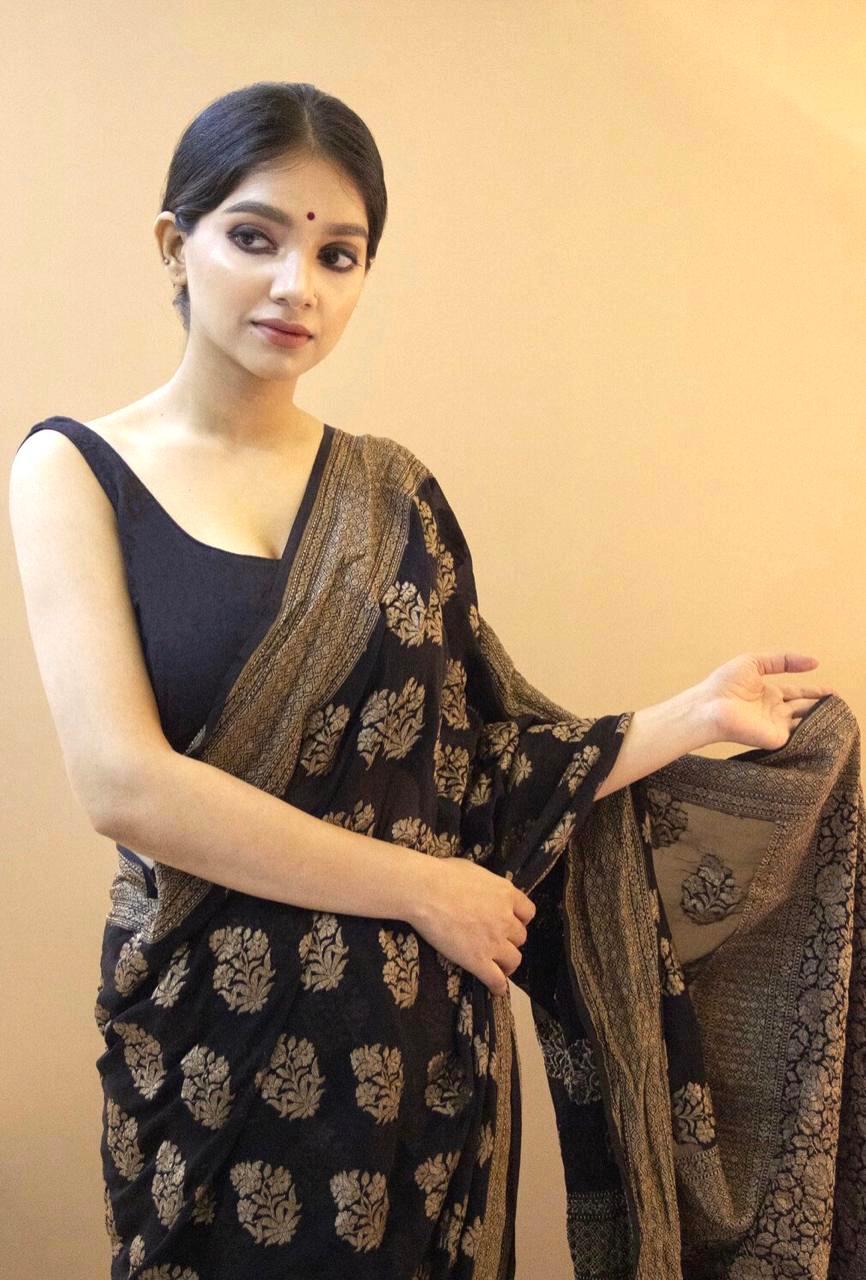 Brilliant Black Soft Silk Saree With Extravagant Blouse Piece