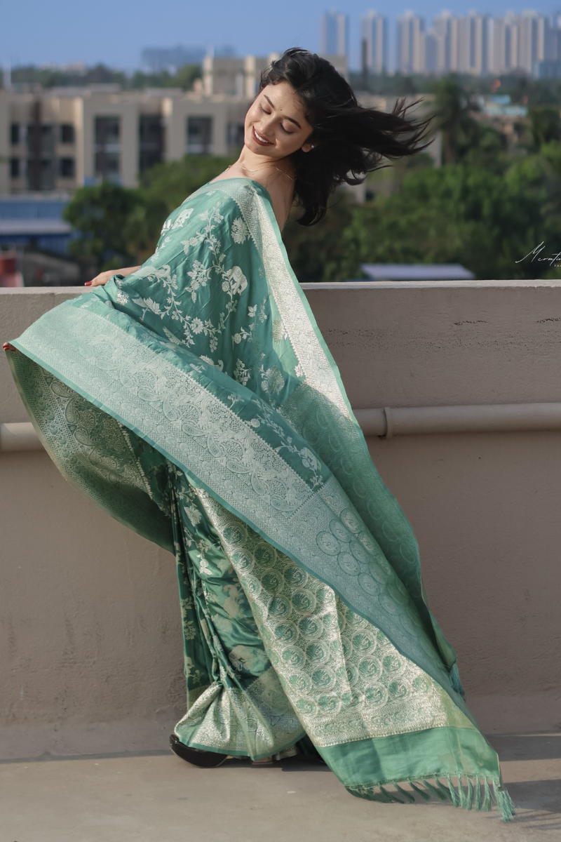 Elegant Dolla Silk Cotton Saree with Unique Floral & Minakari Prints.