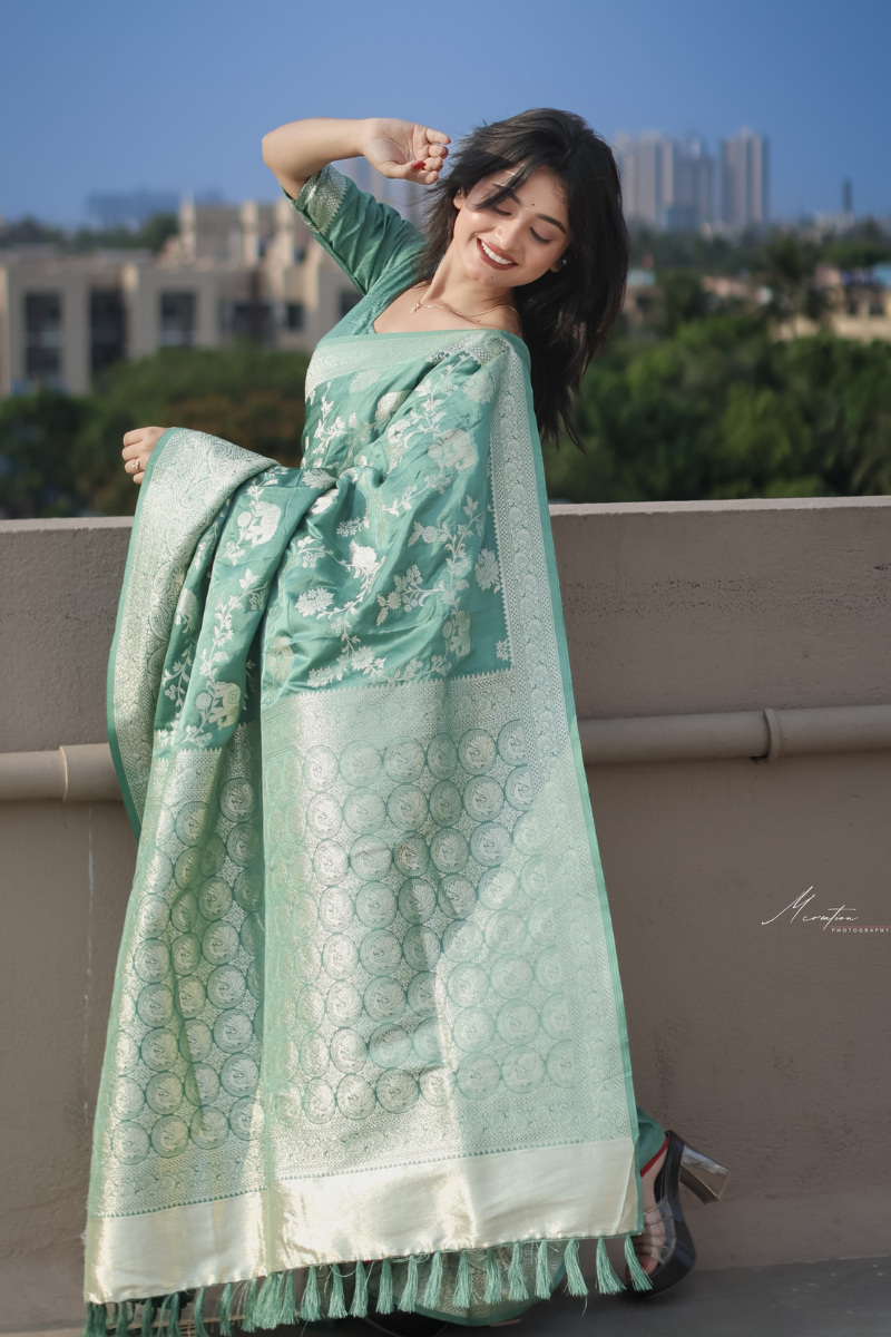 Elegant Dolla Silk Cotton Saree with Unique Floral & Minakari Prints.
