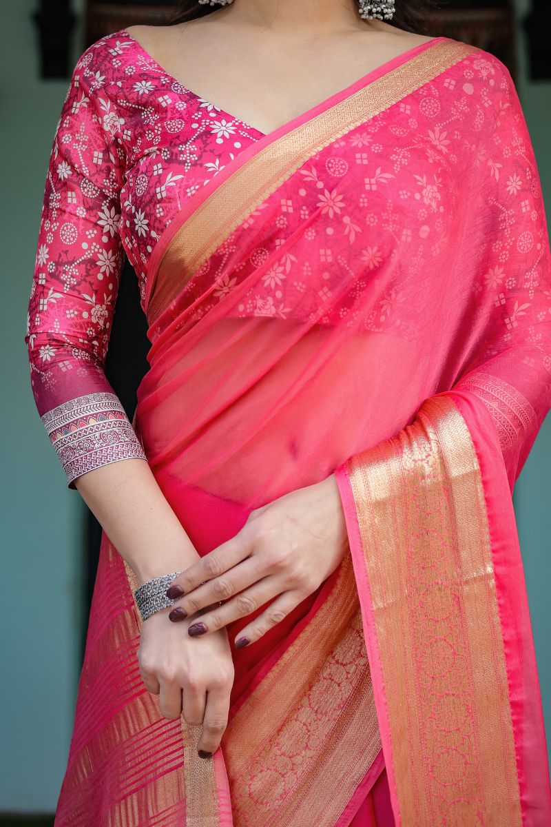Chiffon in a vibrant, hot pink flow Floral weave saree
