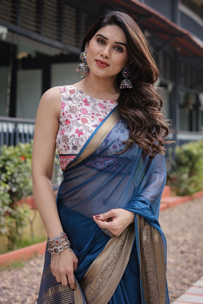 Blue Royal Navy Chiffon that flows softly and has an opulent feel The saree