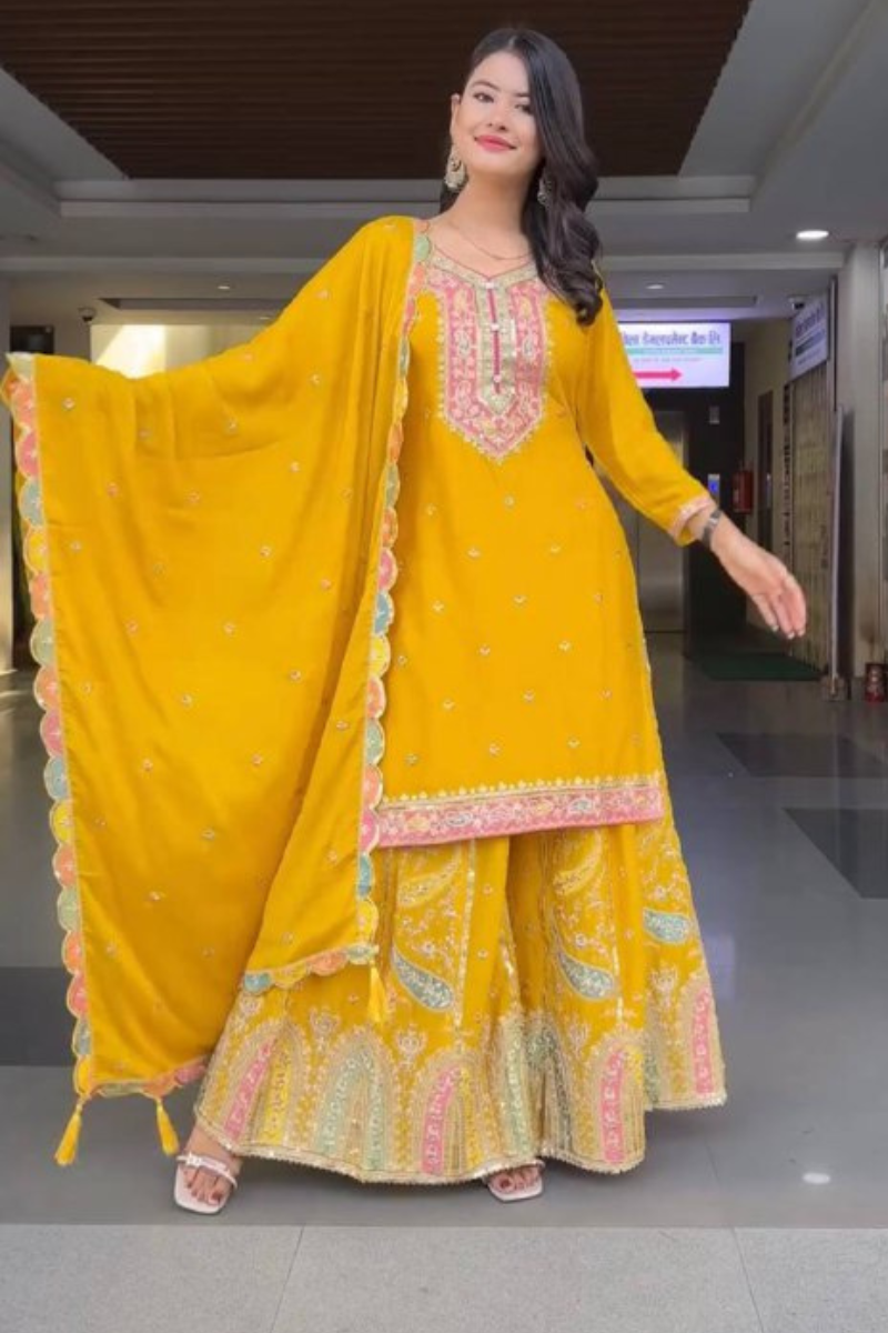 Malty-threaded yellow heavy chinon silk sharara suit.