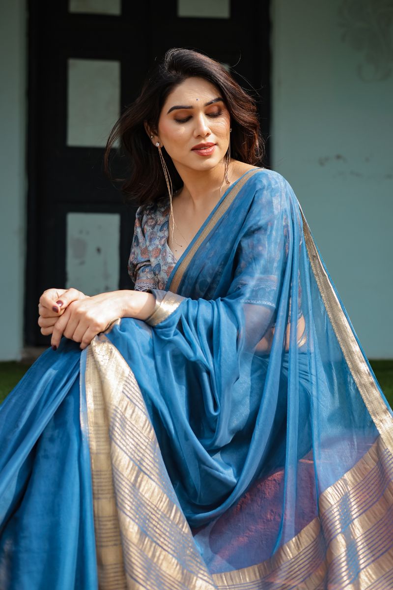 Gorgeous Blue Turquoise Flowy and light chiffon saree