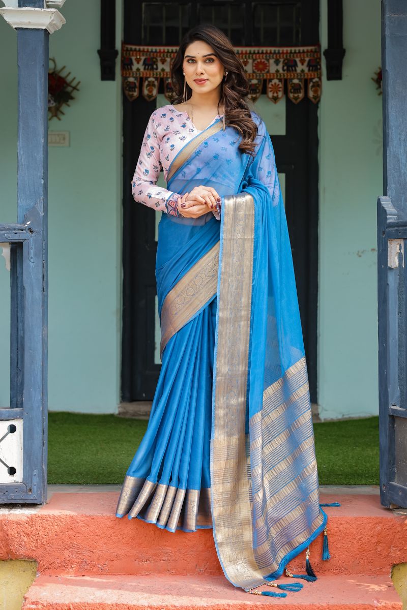 A new sky blue chiffon saree with a flowing drape