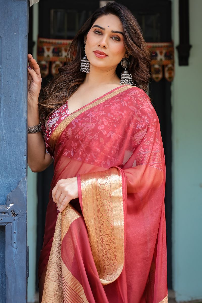 A delicately flowing chiffon saree with delicate floral embroidery