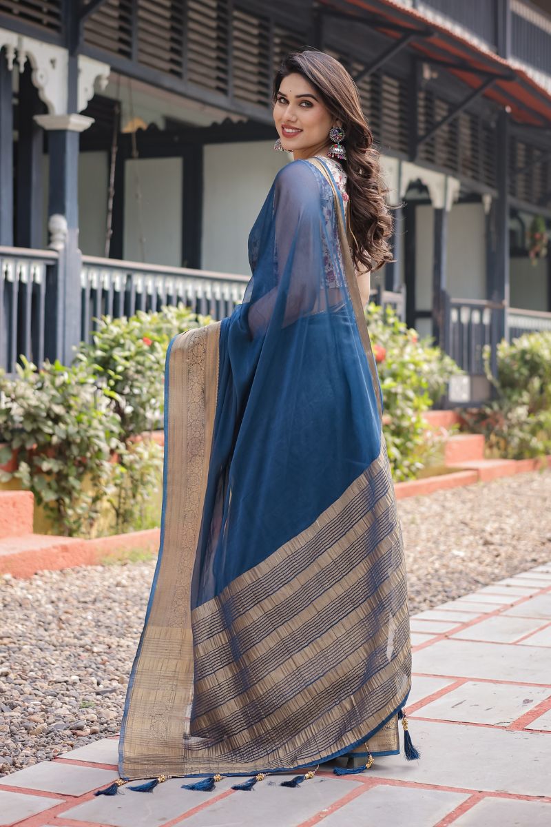 Blue Royal Navy Chiffon that flows softly and has an opulent feel The saree