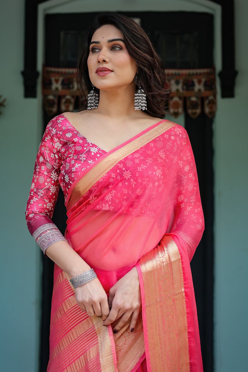 Chiffon in a vibrant, hot pink flow Floral weave saree