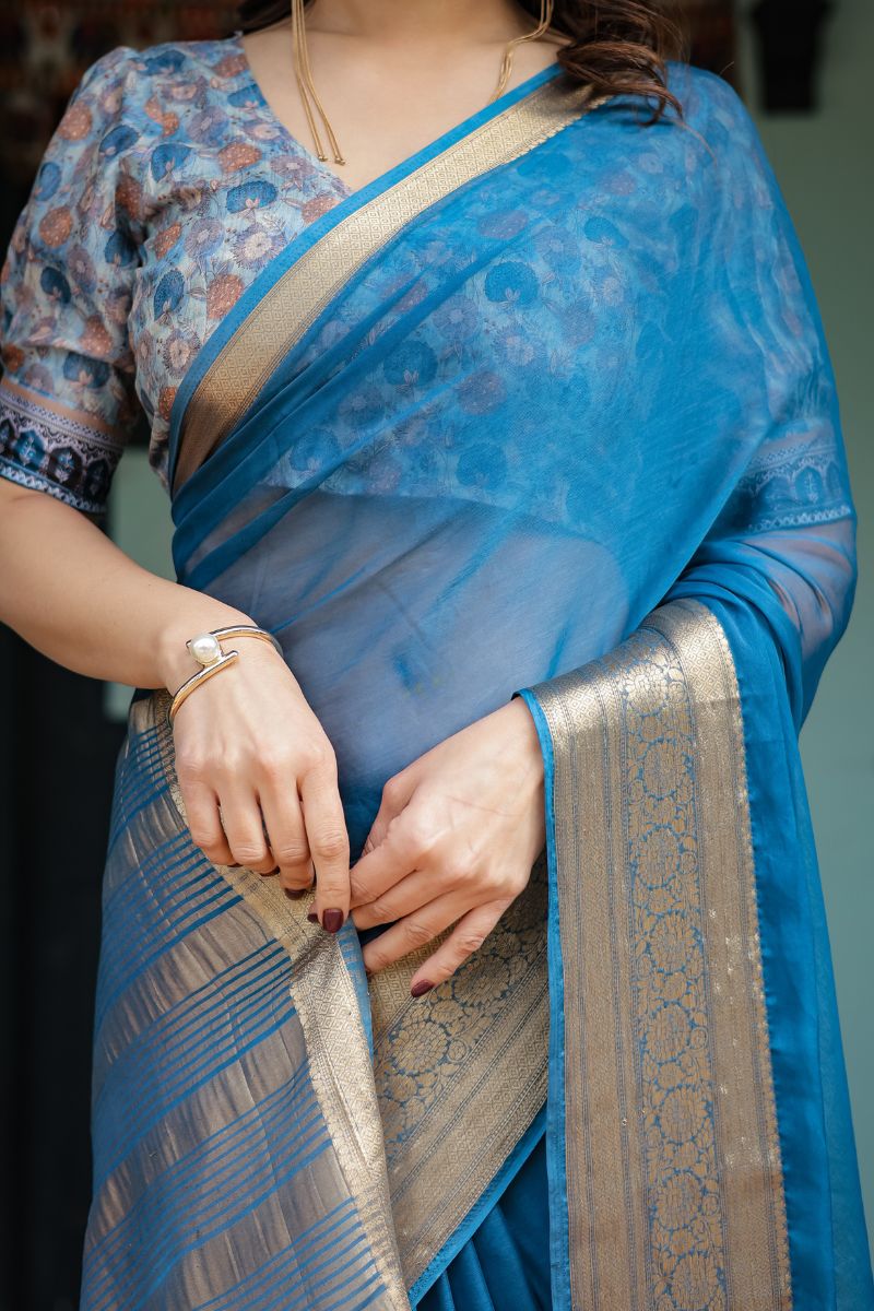 Gorgeous Blue Turquoise Flowy and light chiffon saree