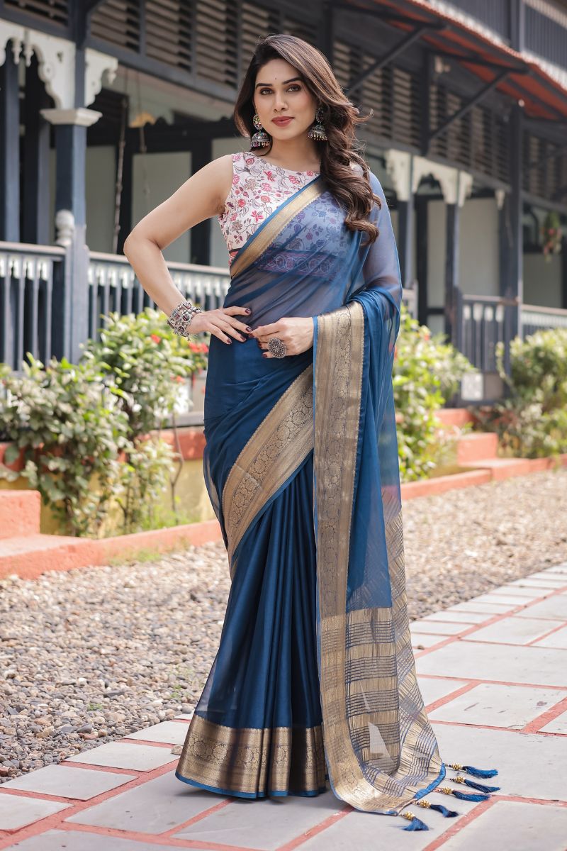 Blue Royal Navy Chiffon that flows softly and has an opulent feel The saree