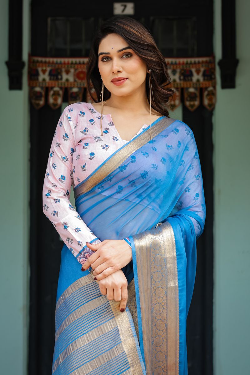 A new sky blue chiffon saree with a flowing drape