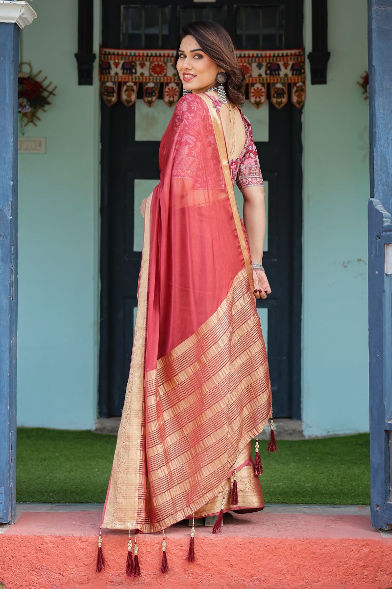 A delicately flowing chiffon saree with delicate floral embroidery