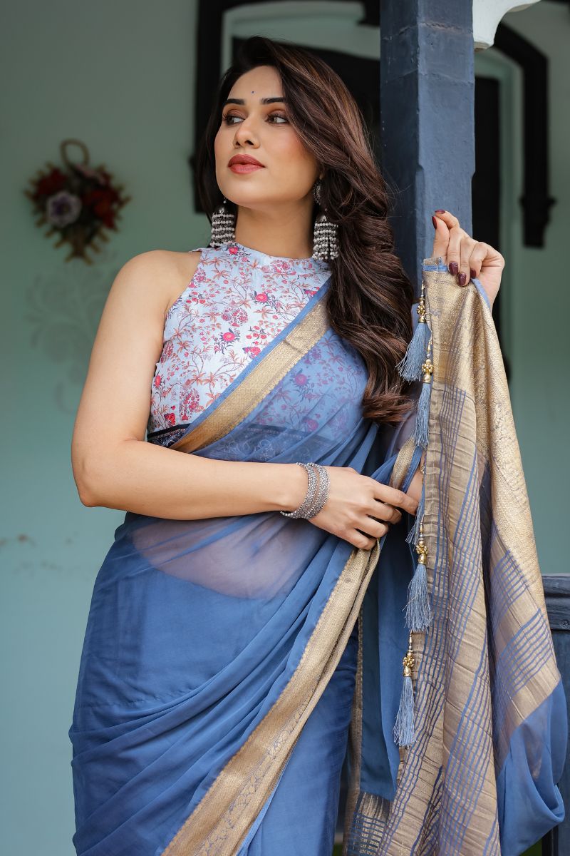 Chiffon in a dusty blue flow for a lovely draping The saree