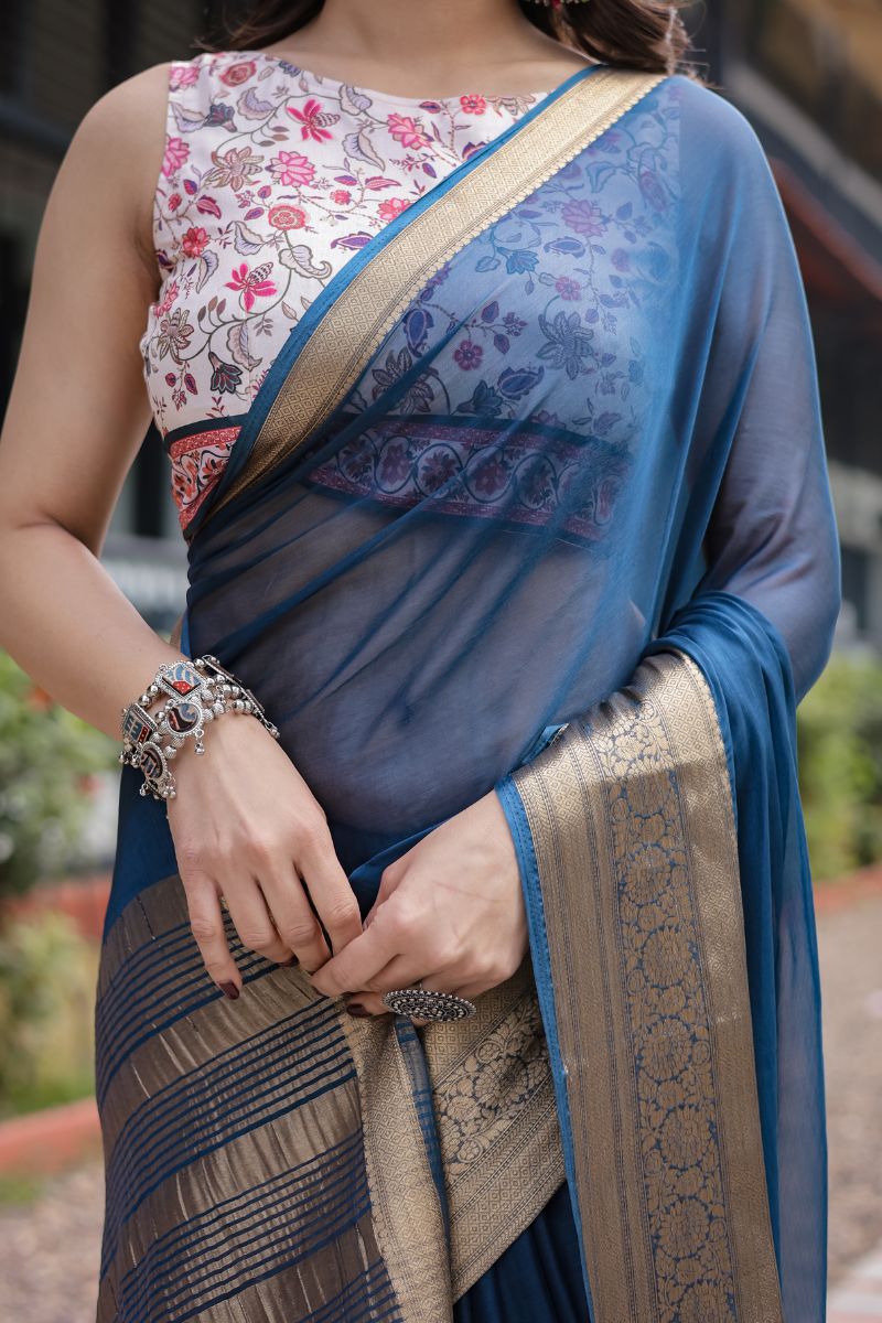 Blue Royal Navy Chiffon that flows softly and has an opulent feel The saree