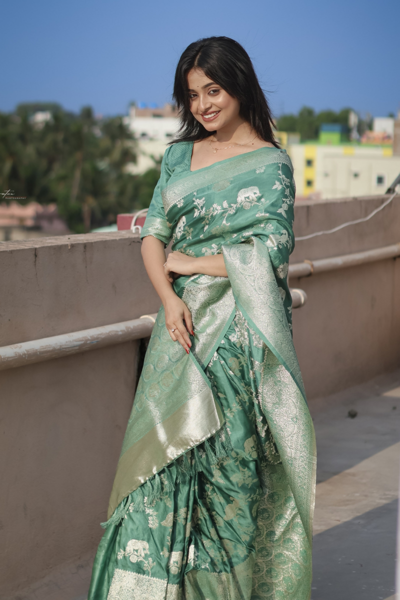 Elegant Dolla Silk Cotton Saree with Unique Floral & Minakari Prints.