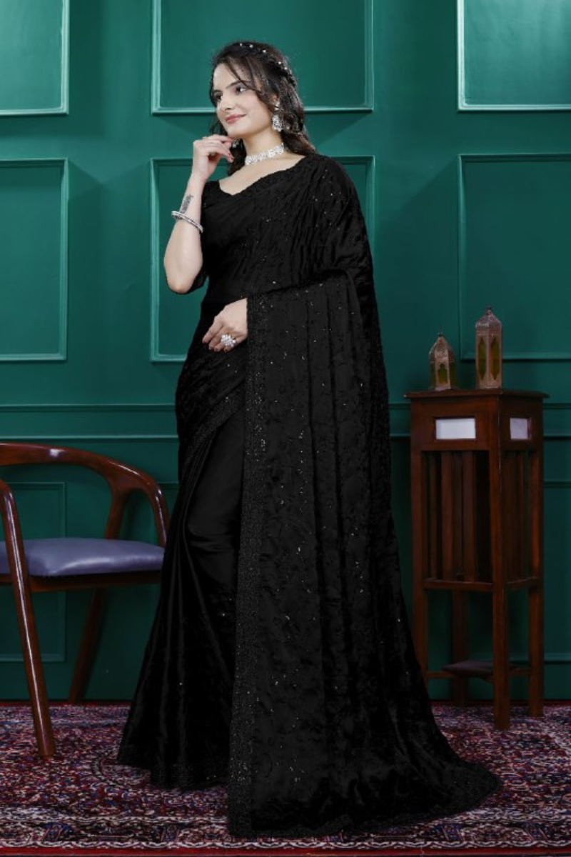 Multi-sequence and cut embroidery on a black rangoli silk saree