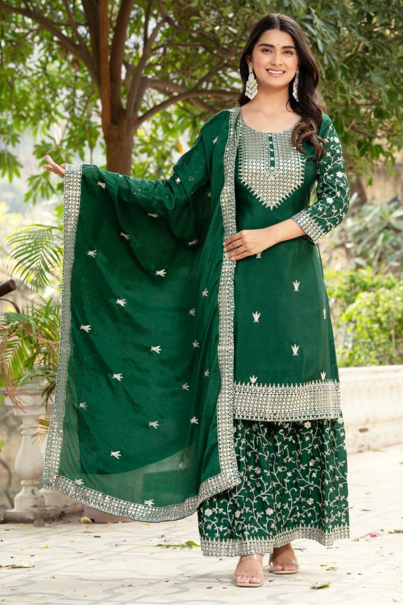 Three-piece Sharara suit set in dark green with embroidered lace border for Chinon