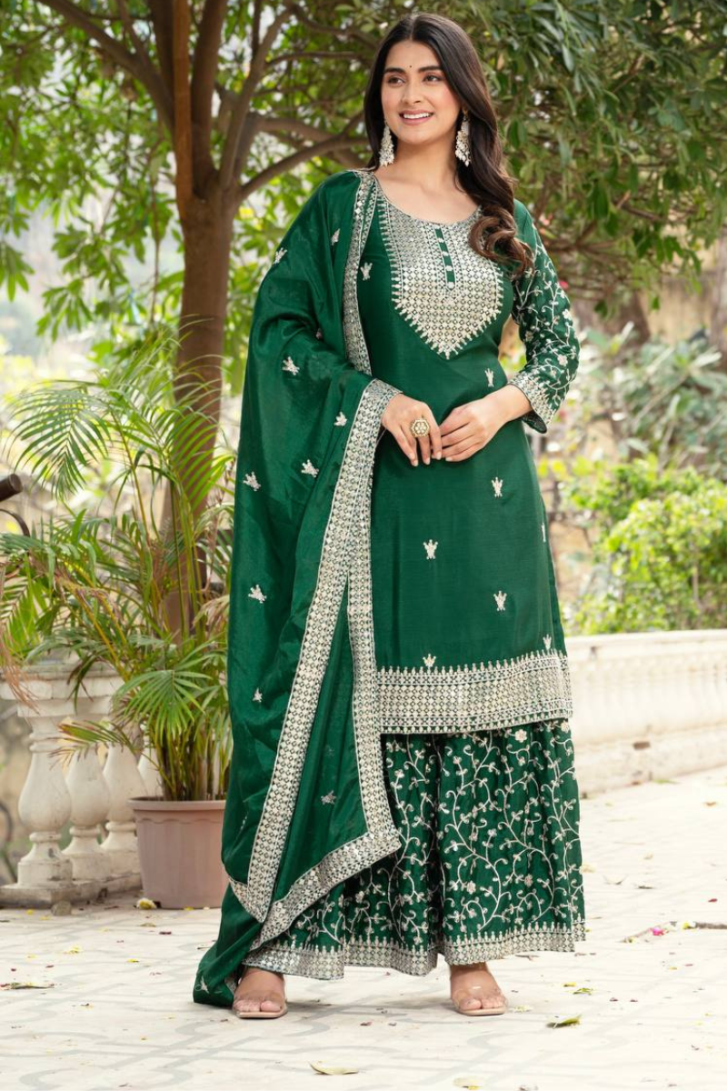 Three-piece Sharara suit set in dark green with embroidered lace border for Chinon
