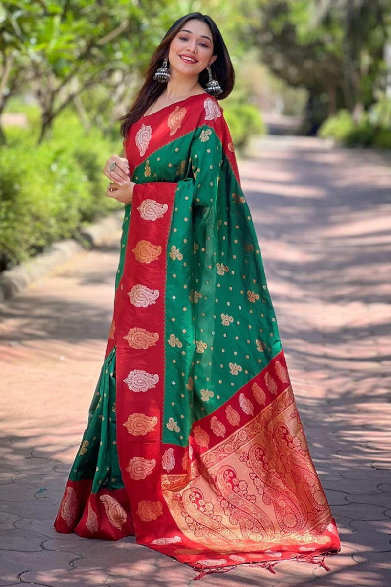 Rose gold designs on a dark green, soft silk Paithani saree