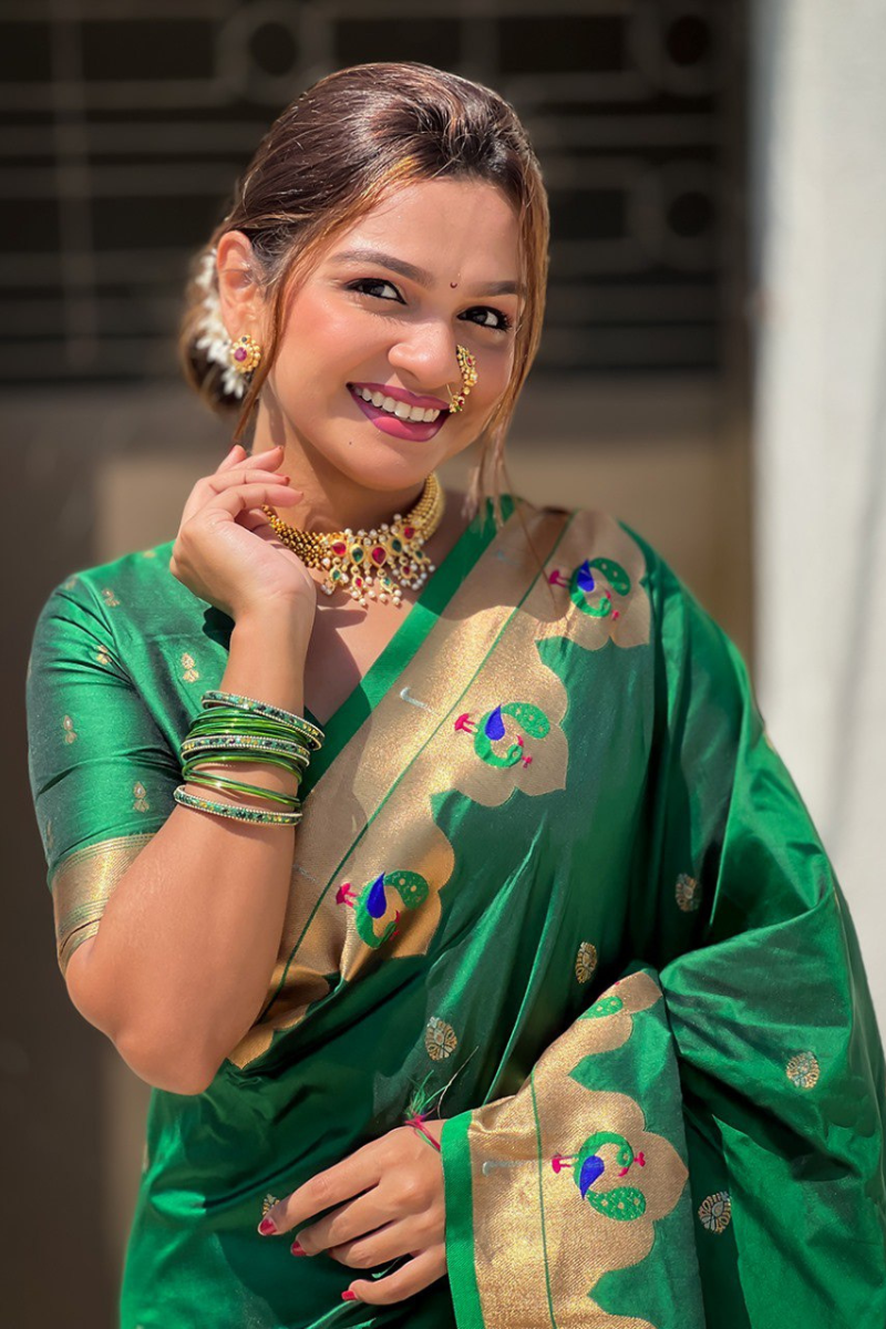 Paithani sarees in green with zari patterns throughout