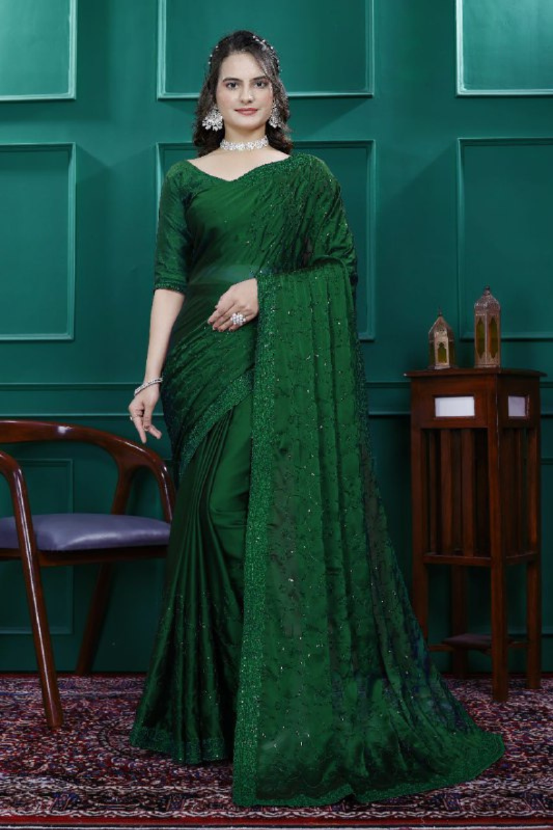 Multi-sequence and cut embroidery on a green rangoli silk saree