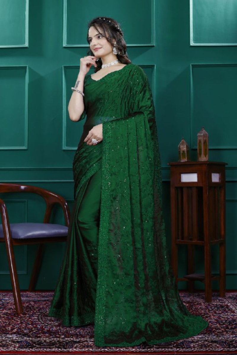 Multi-sequence and cut embroidery on a green rangoli silk saree