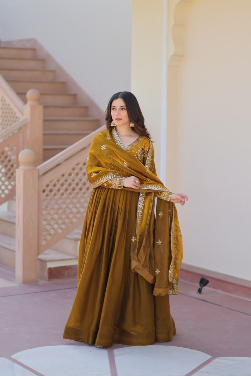 Mustard Fendy Fabric Gown with Embroidered Work and Dupatta Sequins