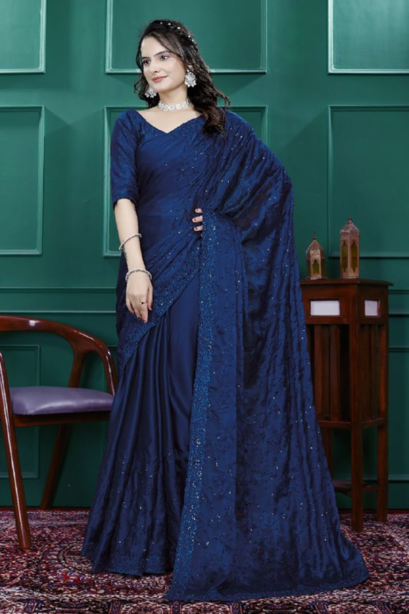 Multi-sequence and cut embroidery on a navy blue rangoli silk saree