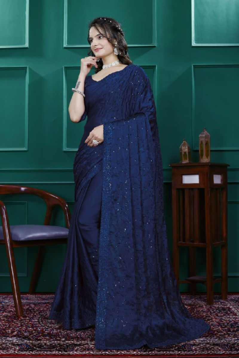 Multi-sequence and cut embroidery on a navy blue rangoli silk saree
