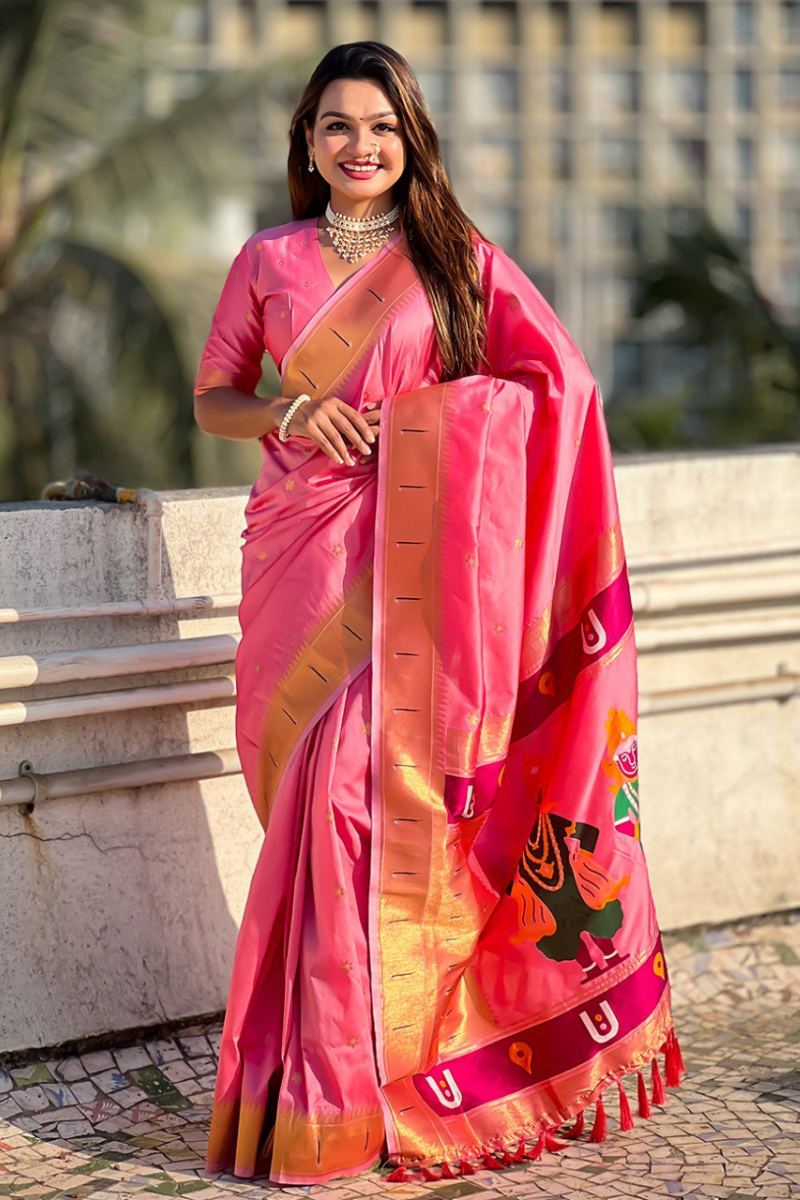 Floral designs woven into pink soft silk sarees