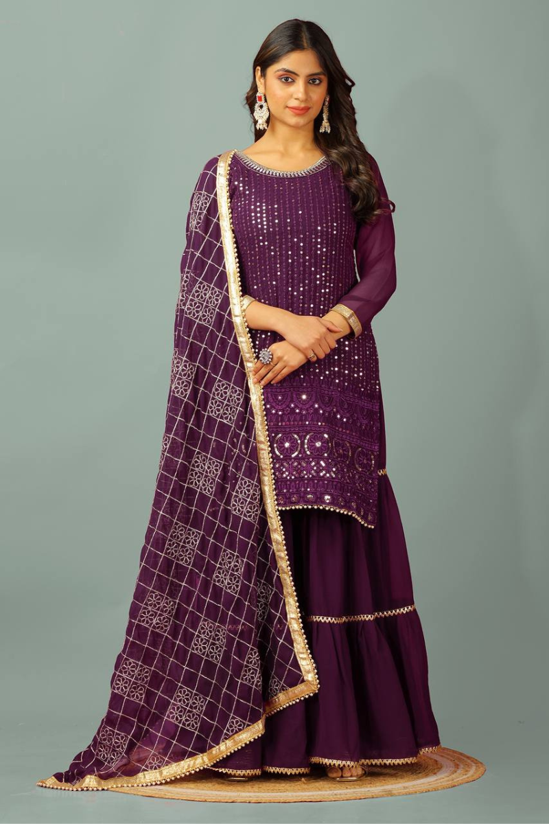 Three-piece embroidered kurta dupatta suit set in purple faux georgette