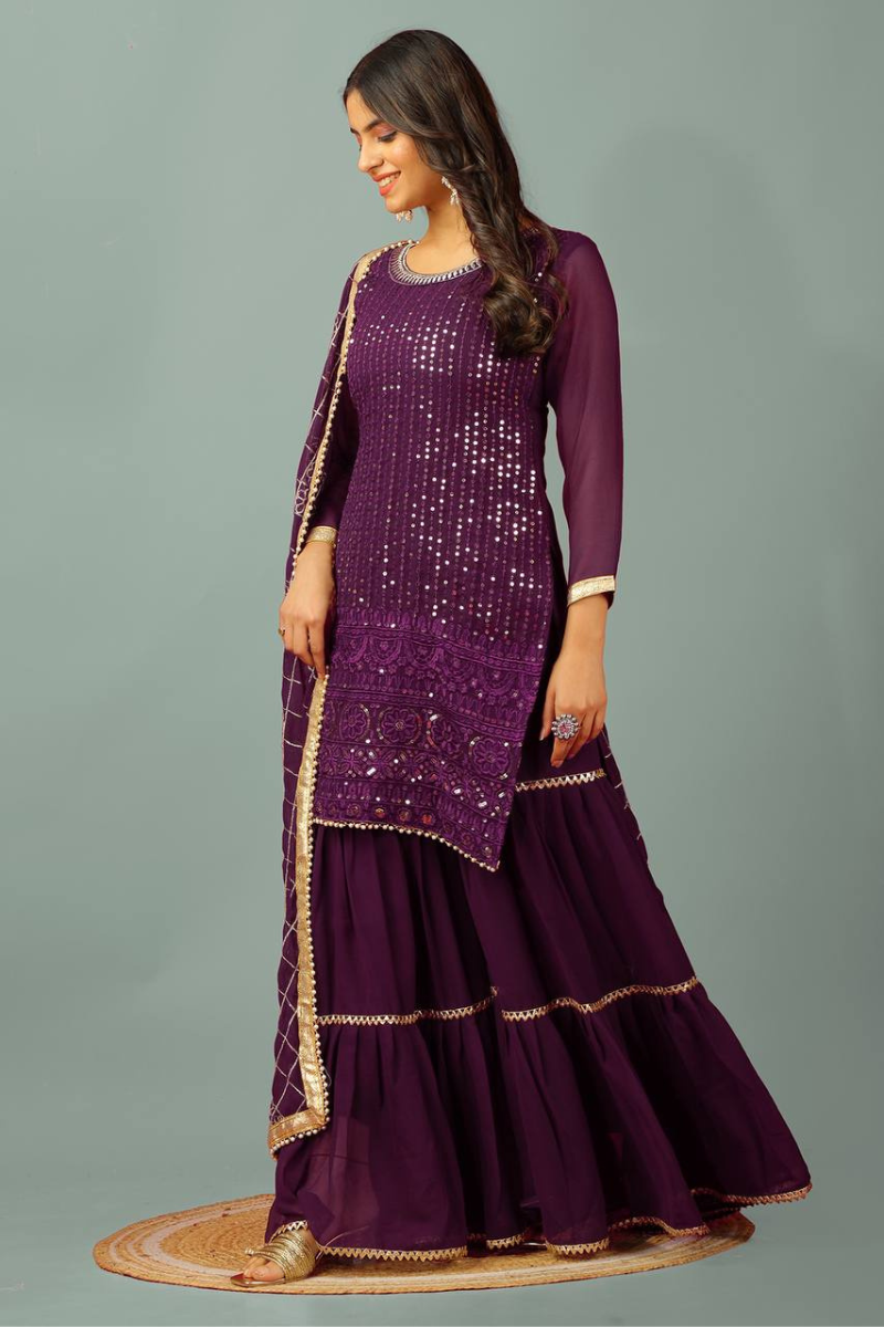 Three-piece embroidered kurta dupatta suit set in purple faux georgette