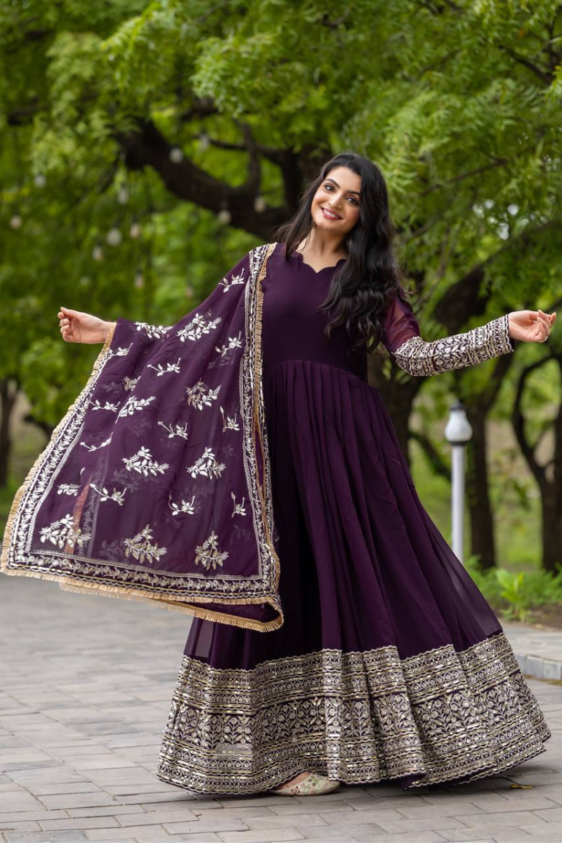 Faux Purple Three-piece suit set with a Georgette gown, dupatta, and pants