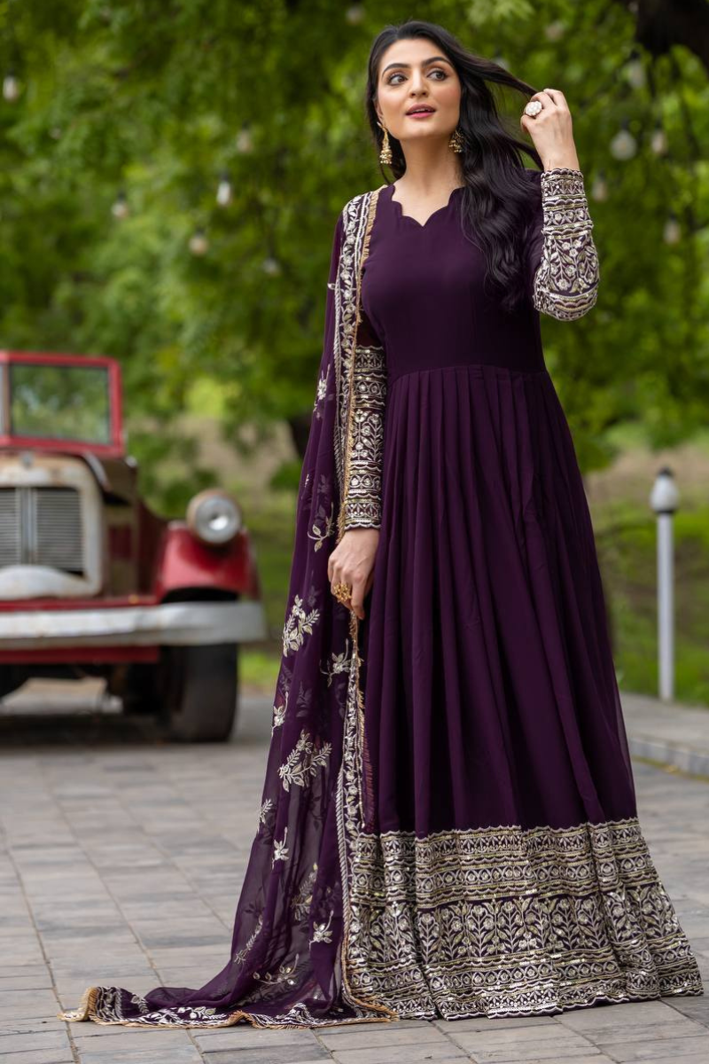 Faux Purple Three-piece suit set with a Georgette gown, dupatta, and pants