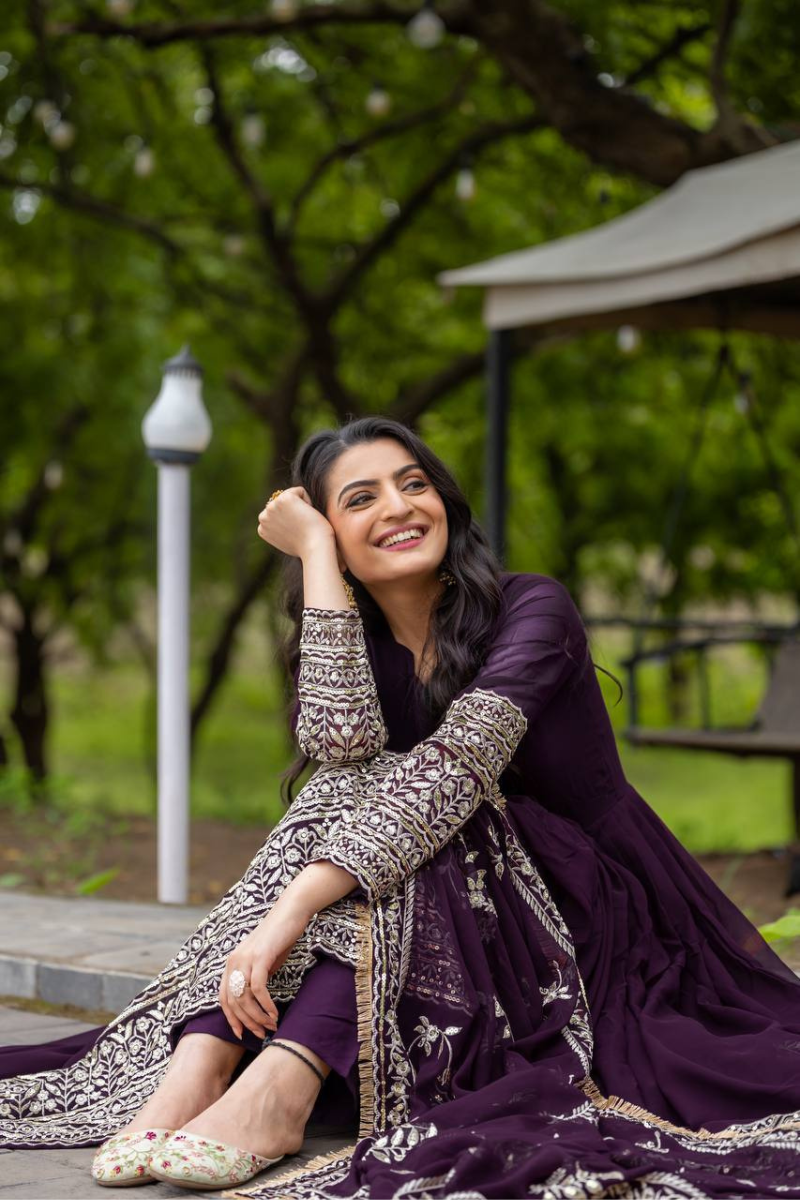 Faux Purple Three-piece suit set with a Georgette gown, dupatta, and pants