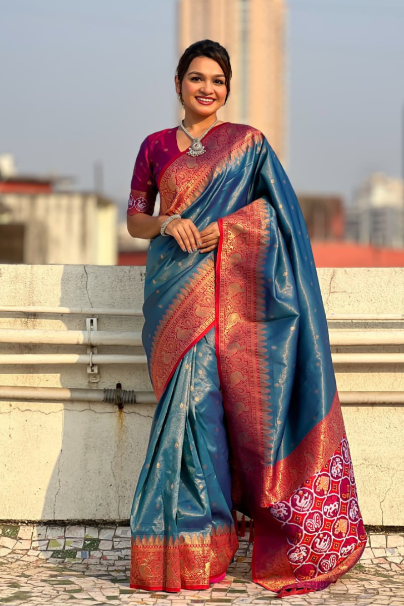 Sarees made of teal Katki silk with floral designs
