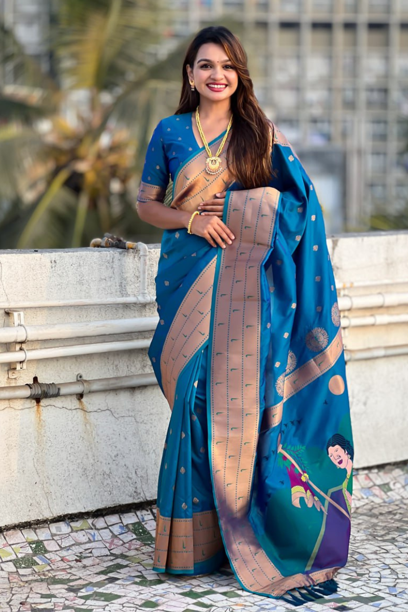 Soft silk sarees in teal Paithani with floral designs