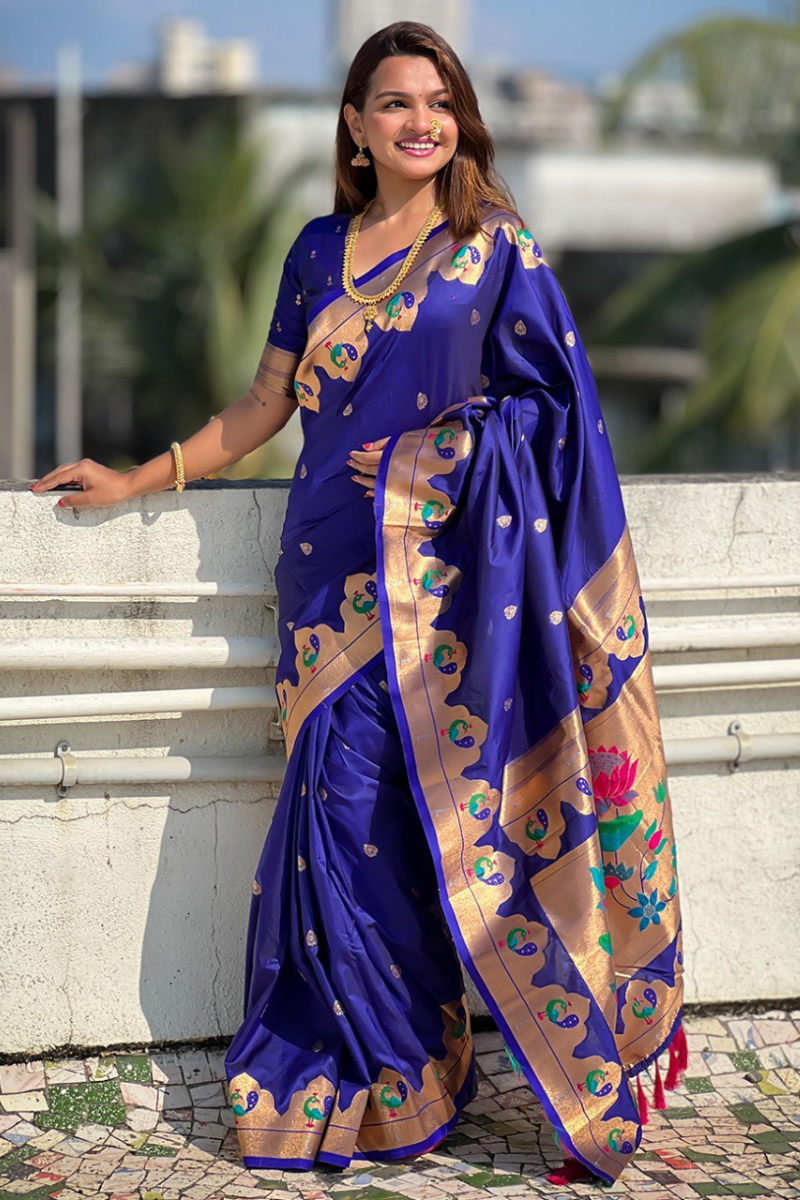 Sarees in violet Paithani with zari patterns throughout