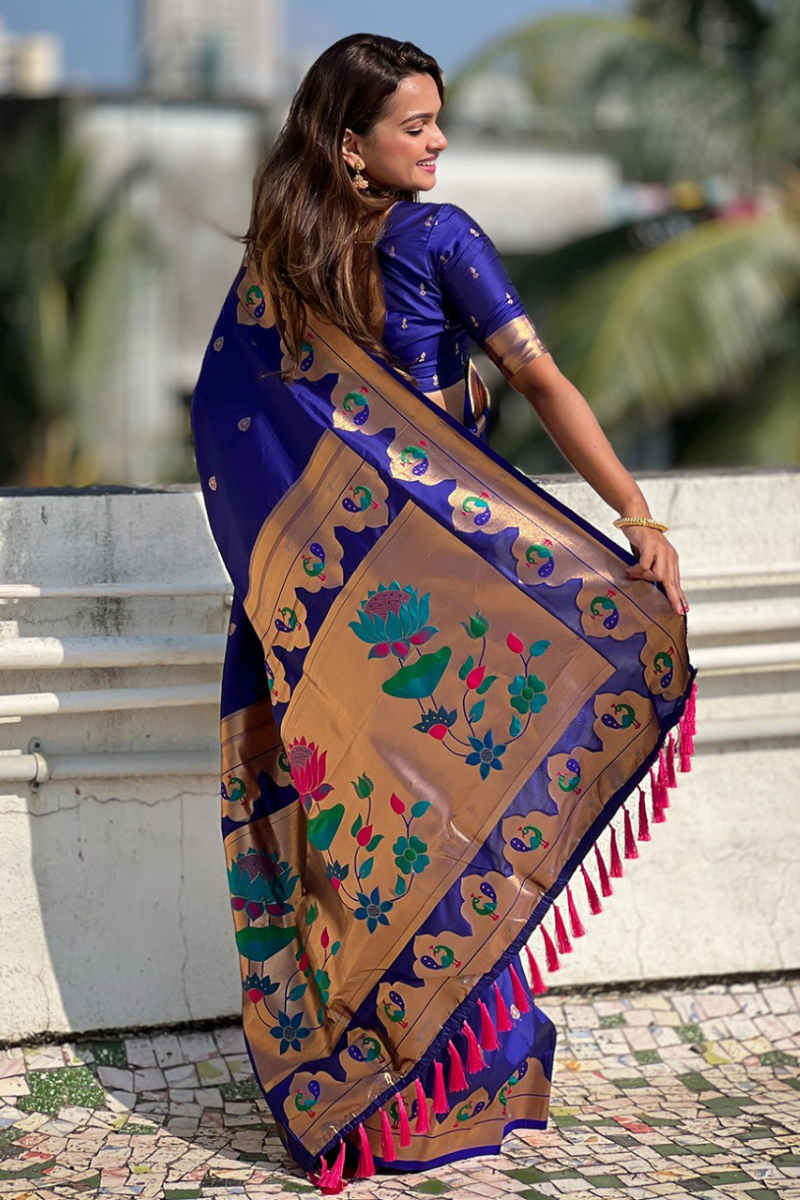 Sarees in violet Paithani with zari patterns throughout