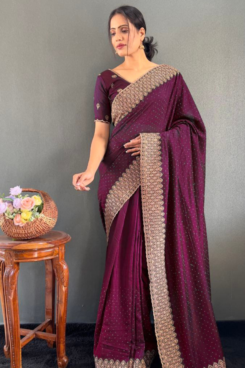 Vichitra silk saree with lovely Zari and wine blooming