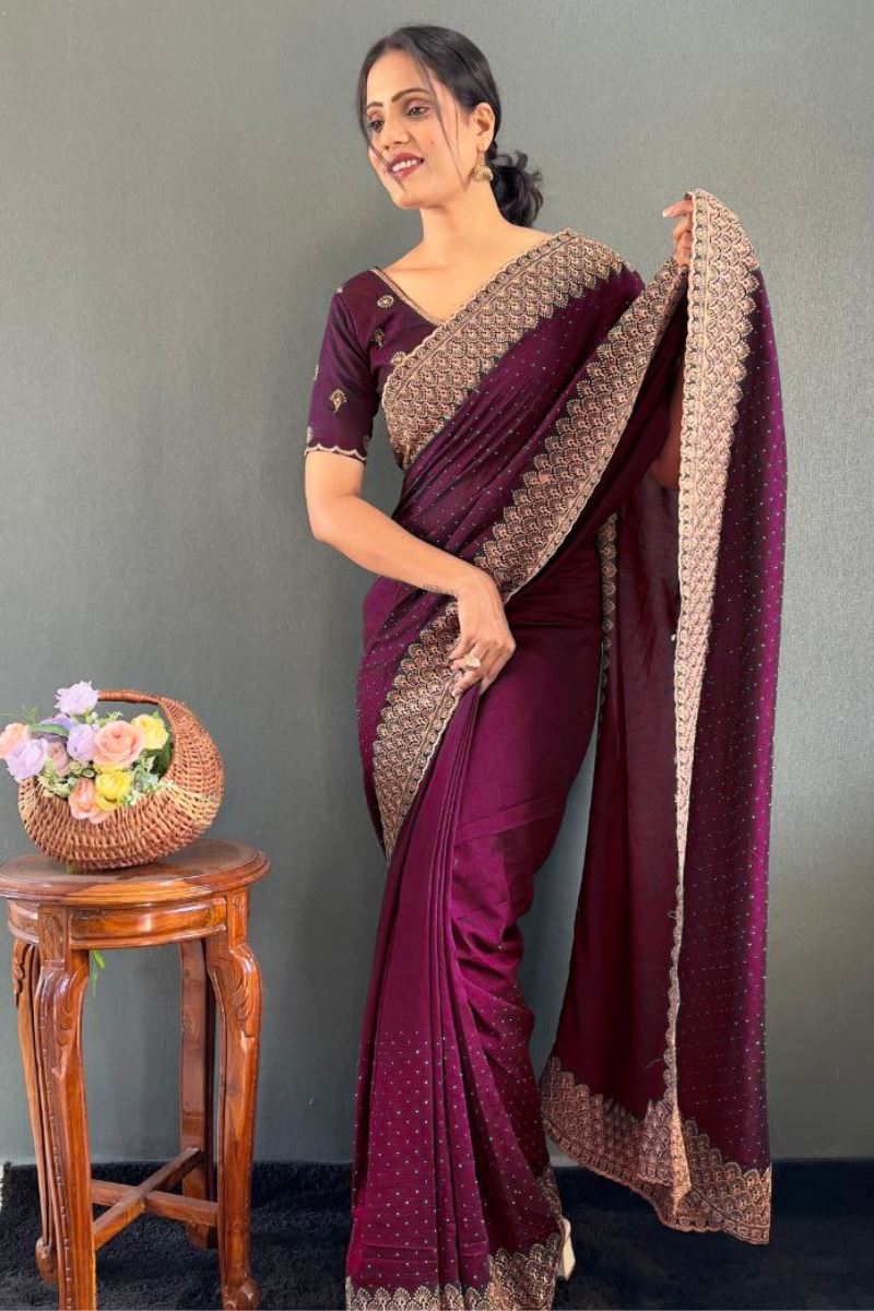 Vichitra silk saree with lovely Zari and wine blooming