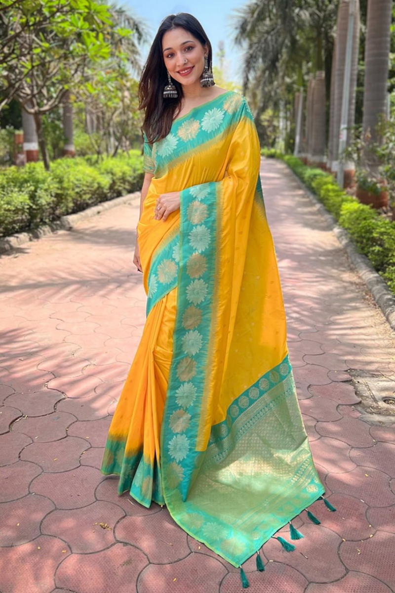 Soft silk saree in yellow with small motifs Zari Weaving