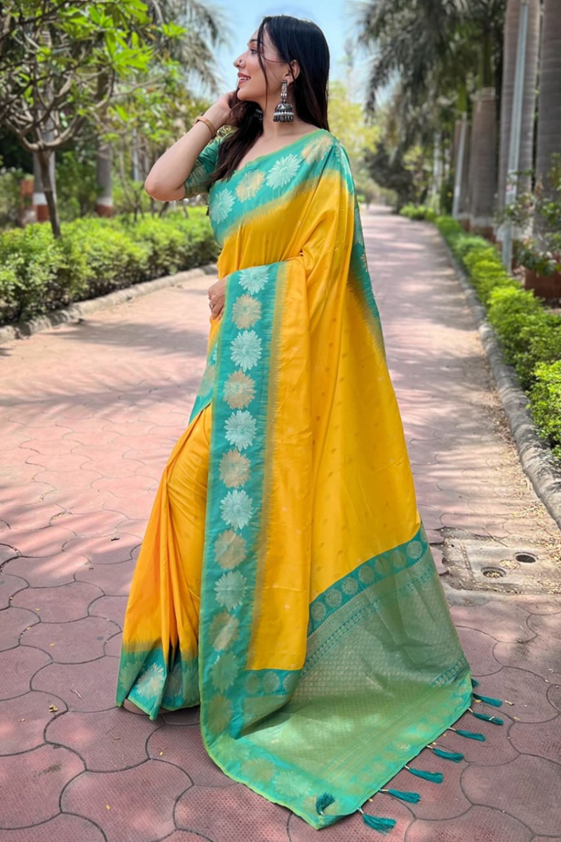 Soft silk saree in yellow with small motifs Zari Weaving