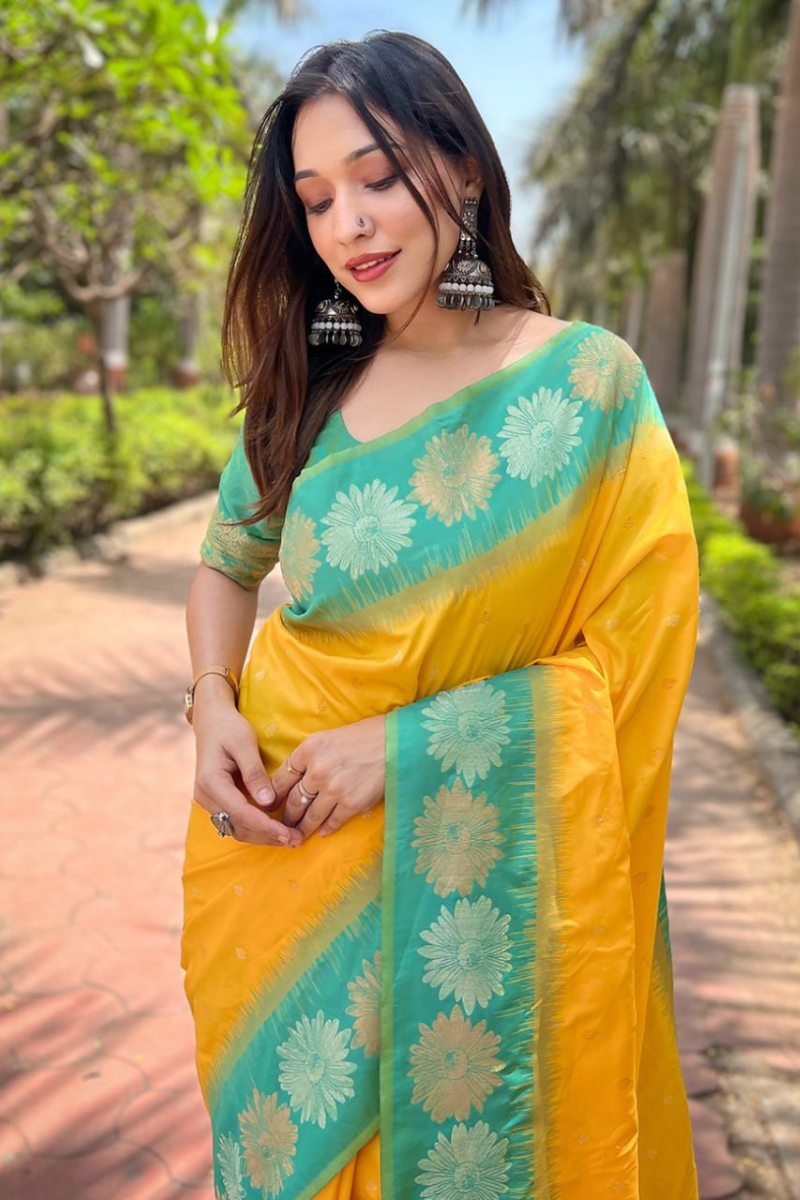 Soft silk saree in yellow with small motifs Zari Weaving